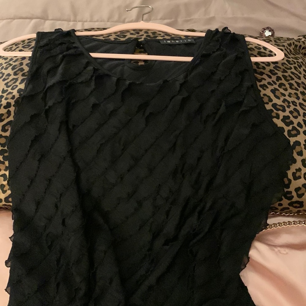 Janeric flowy black 60s top size m